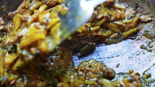 Cooked Vegetables and Shredded Meat in Pan, Close-up of a pan with cooked vegetables and shredded meat