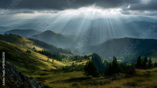 Beautiful serene mountain landscape, fluffy clouds, sun rays