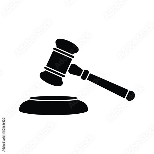 Black silhouette of a judge s gavel and sounding block