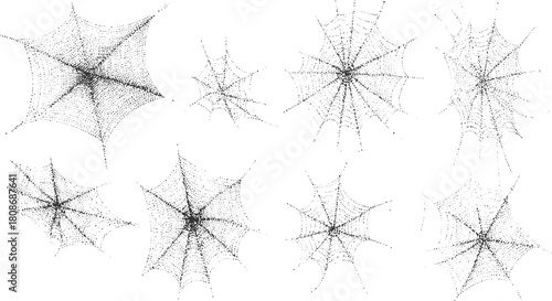 Collection of eight black and white dotted spiderwebs of varying sizes and shapes on a white background
