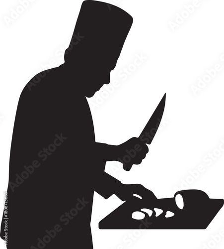 Silhouette of a chef chopping food on a cutting board