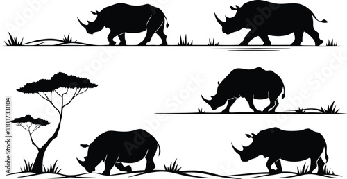 Stunning rhino silhouettes grazing in the African savanna, evoking wildlife conservation and safari adventures, perfect for educational and nature projects
