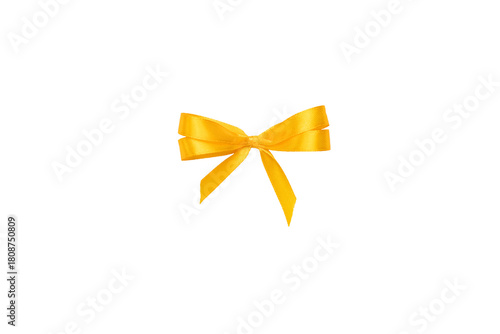 Bright yellow ribbon bow isolated on white background. Perfect for gift wrapping, festive decorations or product packaging concepts.