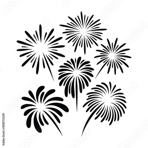 Collection of stylized black and white fireworks bursting in the night sky celebration