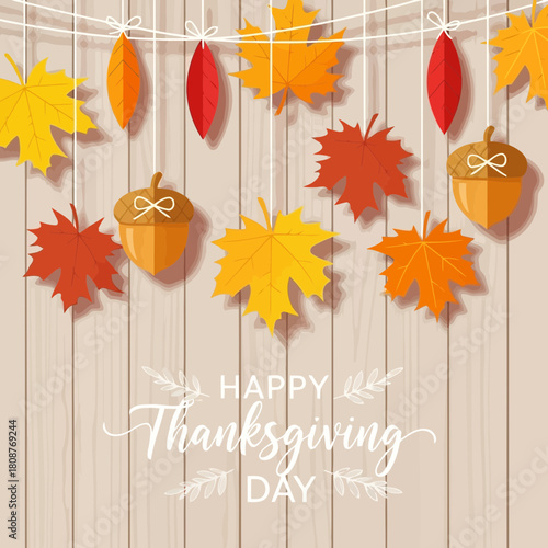 Happy thanksgiving day celebration with autumn leaves, pumpkins, and acorns hanging on a string against a wooden background