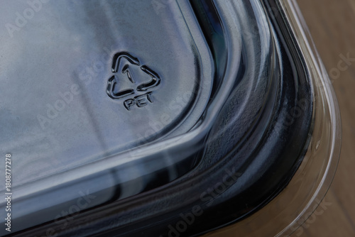 PET symbol on the corner of a plastic food packaging cover.