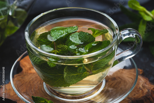 Mint tea in a glass mug