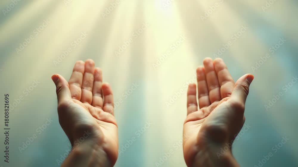Scared Hand Rised Up Two weathered hands raised in prayer, overlaid with gentle rays of ...