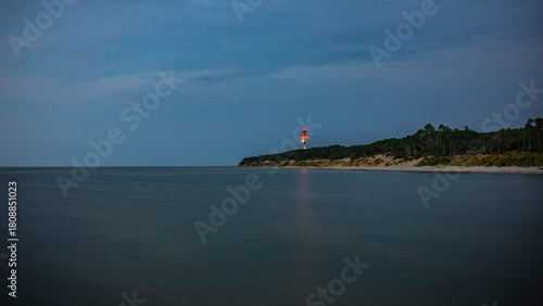 Fototapeta Naklejka Na Ścianę i Meble -  Lighthouse in the Baltic Sea after sunset