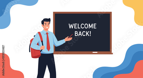 A cheerful male teacher stands beside a chalkboard with a welcome back message, gesturing with a red pen and carrying a backpack, symbolizing the start of the school year.