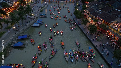 Asia, Vietnam , Hoi An, the city of lanterns, a UNESCO World Heritage Site . the traditional navigation with colored lanterns at night on the Thu Bon River - tourist attraction destination Vietnam 