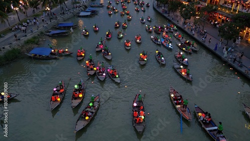 Asia, Vietnam , Hoi An, the city of lanterns, a UNESCO World Heritage Site . the traditional navigation with colored lanterns at night on the Thu Bon River - tourist attraction destination Vietnam 