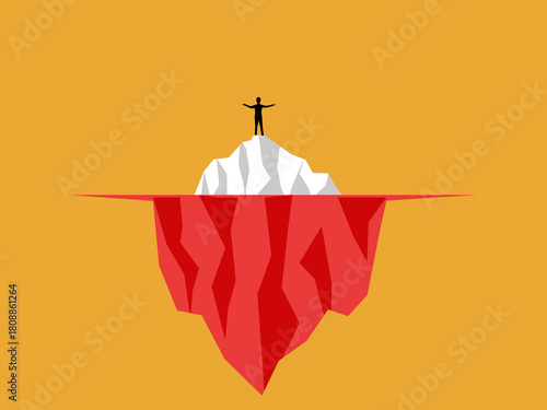  businessman stands confidently on an iceberg.