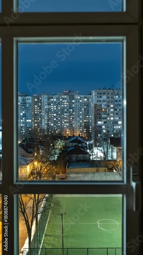 Night Cityscape View Through Window Building Lights Sports Field Footage