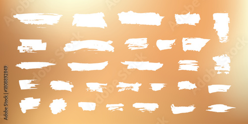 White grungy scratches collection isolated on golden background. Scribble textures for lottery scratch