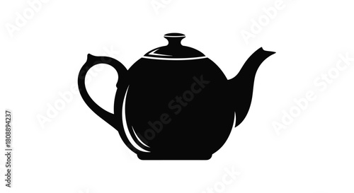 Black silhouette of a classic teapot with a handle and spout against a white background.