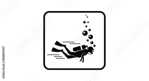 Silhouette of a scuba diver swimming underwater with bubbles rising to the surface.