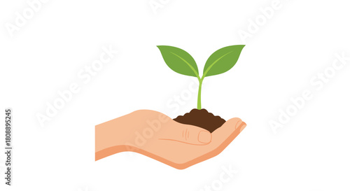 A hand holding soil with a young green plant sprouting upwards.