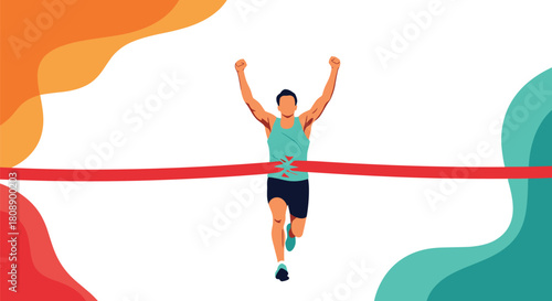 A runner breaks the finish line tape with arms raised in victory at a race.