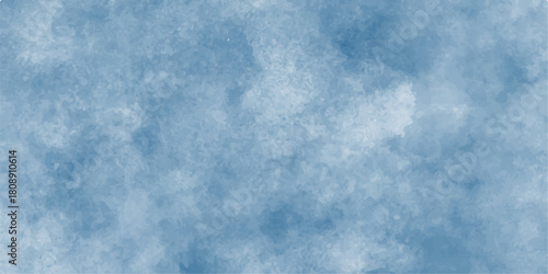 Blue sky with fluffy white cumulus clouds on a clear summer day showing a natural cloudscape and clear atmosphere. Abstract blue watercolor background. White and blue mixed watercolor painted leaks