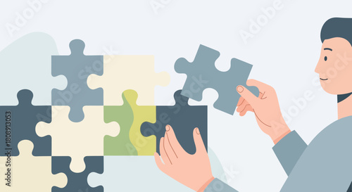 Person holding puzzle piece, symbolizing problem solving and completion