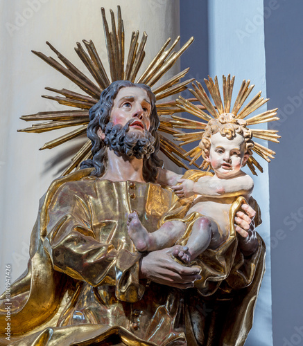 SALZBURG, AUSTRIA - SEPTEMBER 6, 2025: The carved baroque polychrome statue o...