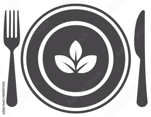 Plant based diet icon with leaves on a plate with a fork and knife for healthy vegan food