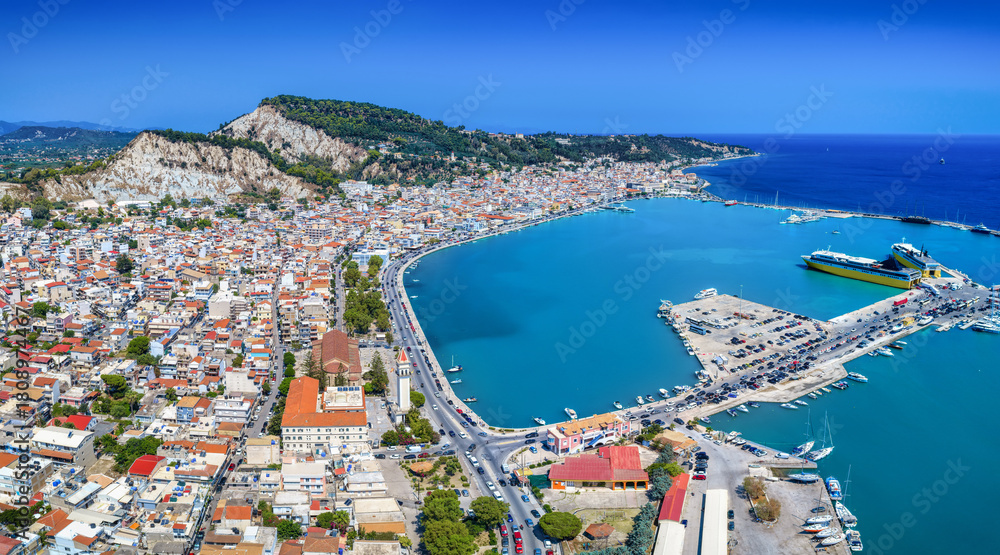 Naklejka premium Panoramic aerial view of the town and port of Zakynthos island, Ionian Sea, Greece, during a sunny summer day