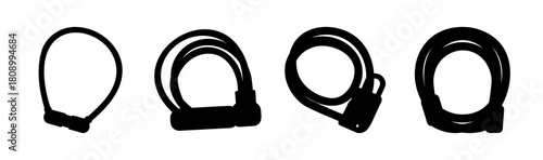 Four distinct cable bicycle locks on a white background