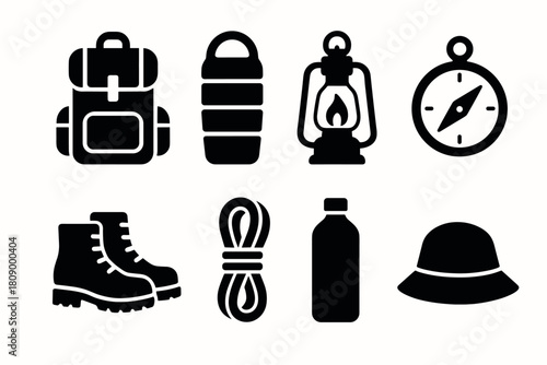Essential camping gear icons: backpack, lantern, compass, and more in silhouette design