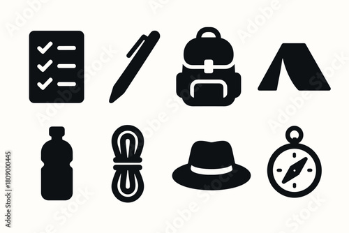 Essential camping gear icons in modern silhouette style for outdoor adventure and travel