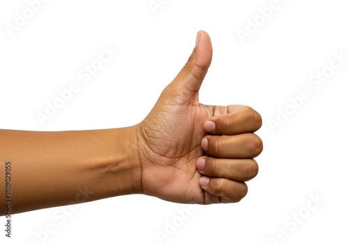 Isolated tanned hand giving a thumbs up gesture of approval, agreement, acceptance, and success