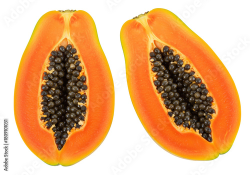 Fotografie Isolated halved fresh papaya with black seeds, orange pulp, tropical summer frui
