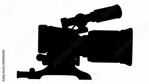 Silhouette of a professional video camera with viewfinder and tripod on a white background image