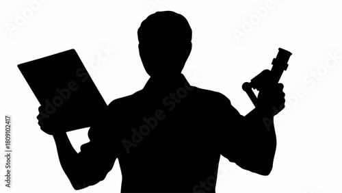 Silhouette of a person holding a clipboard and a microscope against a white background in the studio