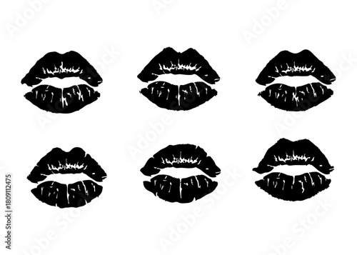 Set of realistic kiss lip imprints in black on transparent background. Vector illustration of human lips, isolated marks for design, decoration, or creative projects.