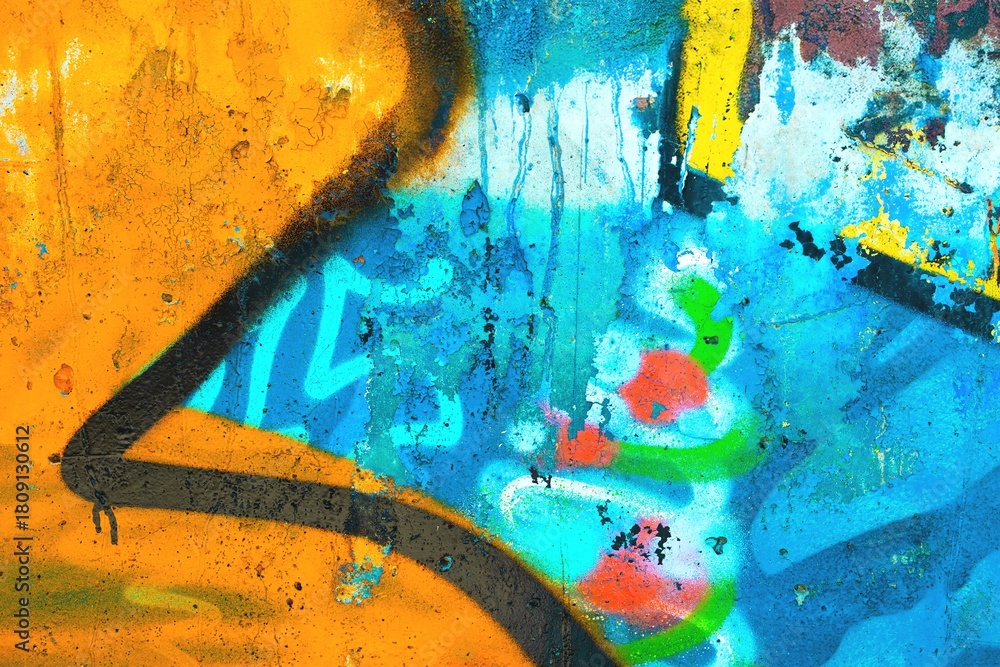 Naklejka premium Vibrant graffiti art featuring bold colors, abstract shapes in blue, orange, green. Modern 2000s, vibrant design, funky, street art. Posters, flyers, urban visuals, creative projects.