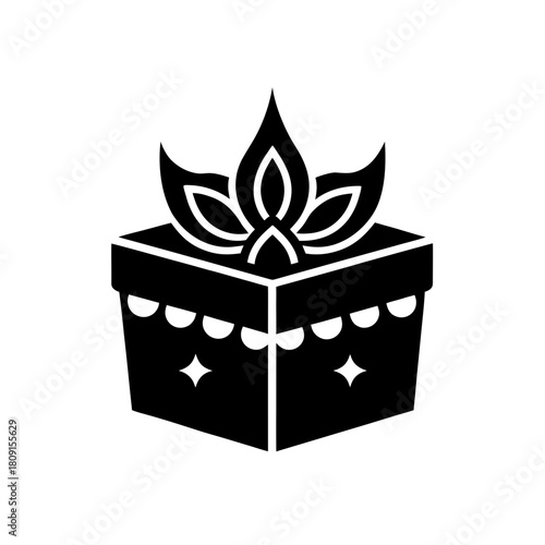 Simple black silhouette of a decorated present box with ornate top.