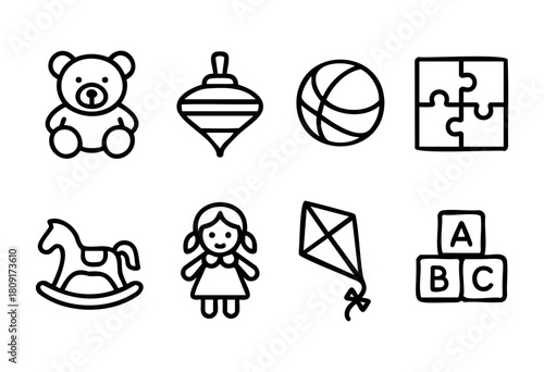 A variety of toys is displayed, including a teddy bear, spinning top, basketball, puzzle piece, rocking horse, doll, kite, and building blocks in a playful setting for kids.