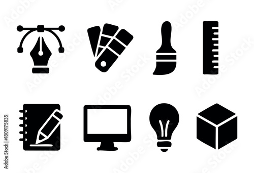 Various graphic design tools such as a pen, color palettes, paintbrush, ruler, notebook, computer, light bulb, and 3D cube are arranged for visual inspiration and creativity.