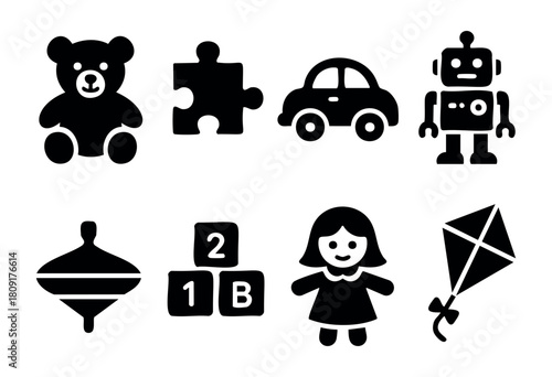 Various toys are displayed, featuring a teddy bear, a puzzle piece, a toy car, a robot, building blocks, a spinning top, a doll, and a kite. These toys encourage imagination and creativity in kids.