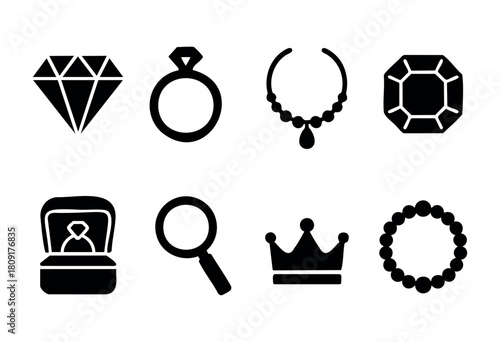 Collection of black icons representing various jewelry items such as diamonds, rings, necklaces, and crowns. These symbols showcase elegance and luxury in a minimalistic design.