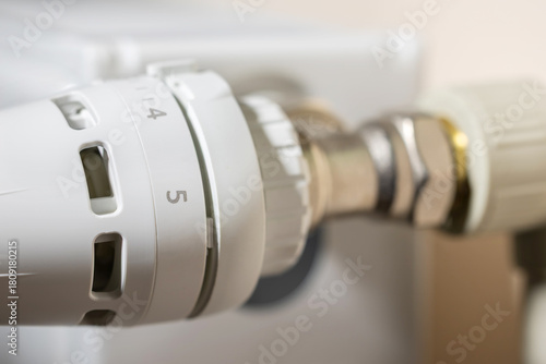 Heating radiator with thermal head close up