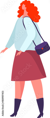 Stylish woman walking forward with her shoulder bag