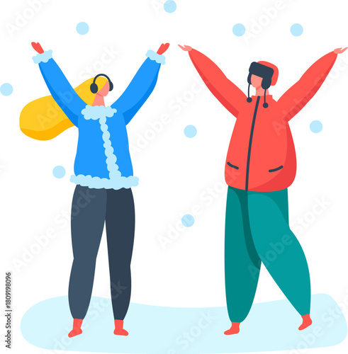 Couple enjoying winter snowfall catching snowflakes