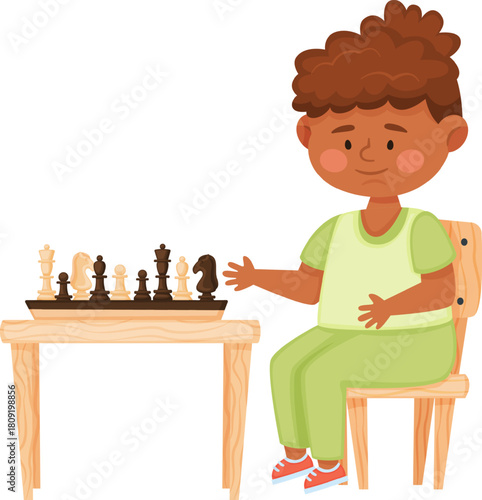 Young boy playing chess promoting smart learning