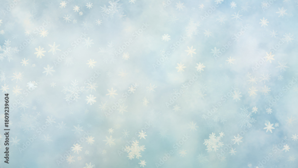 Fototapeta premium Snowflakes Gently Falling Against a Soft Blue Background in a Serene Winter Atmosphere