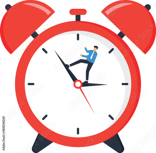 Businessman stopping time on a large alarm clock a time management concept for business deadlines and pressure working against the clock to control productivity and urgency