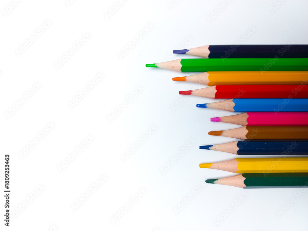 Fototapeta premium Colored pencils placed on a white background