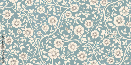 Elegant floral pattern with cream flowers and leaves on blue background